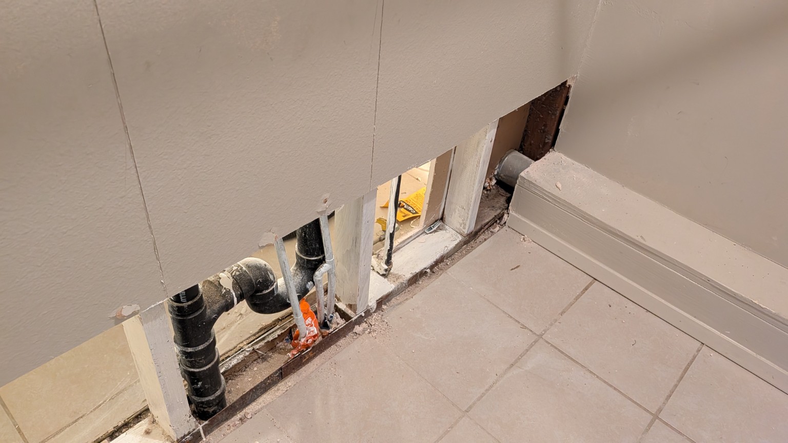 Bathroom plumbing wall repair