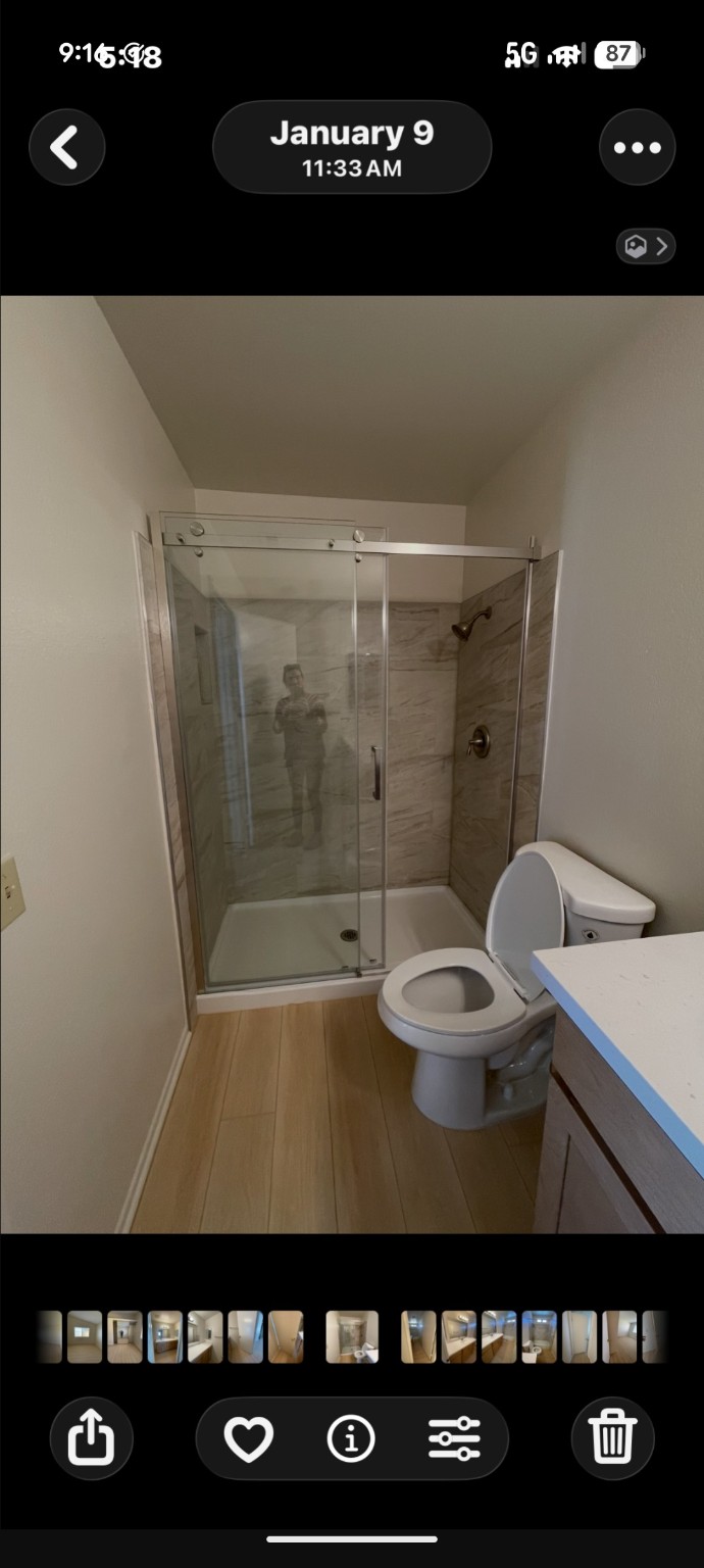 Finished bathroom shower and tub enclosure